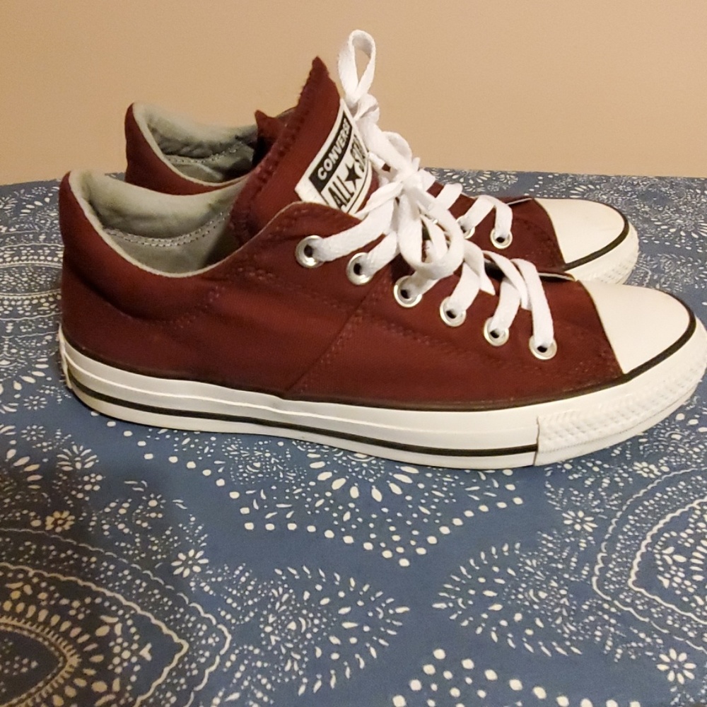 Maroon Chuck Taylors .